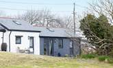 Looking back at the cottage from the pretty garden.  - Thumbnail Image