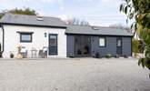 Drive past the front of the barn and park on the gravel where allocated. - Thumbnail Image