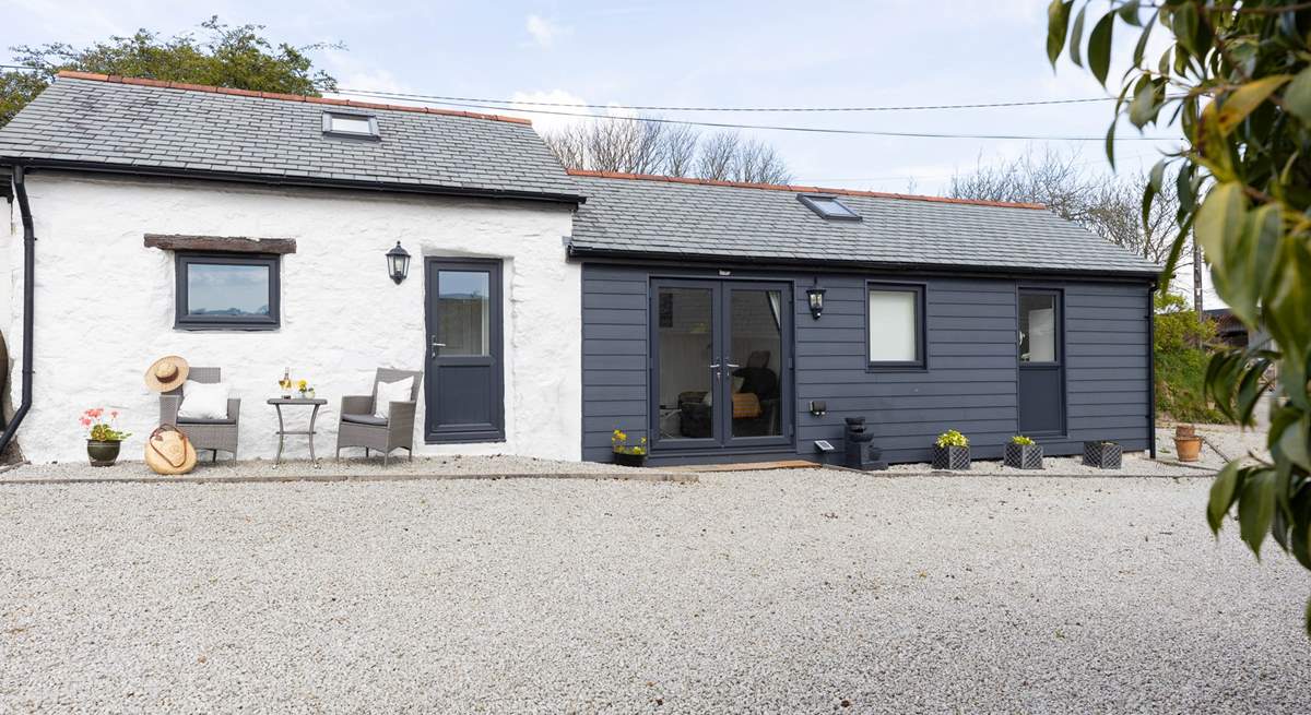 Drive past the front of the barn and park on the gravel where allocated.