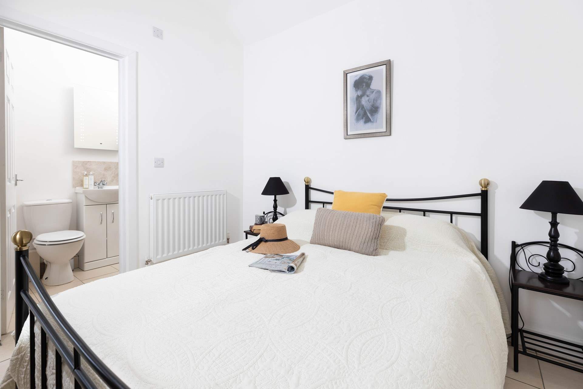 This lovely bedroom has an en suite shower-room. 