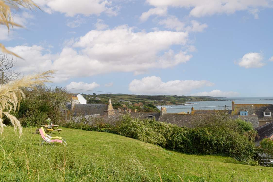 Sea views from the enclosed garden, plenty of room to play and for your four legged friend to run.