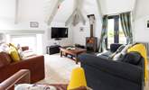 The open plan living-area has doors leading out to the huge enclosed garden. - Thumbnail Image