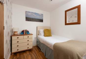 Plenty of space for two in this snug bedroom.
