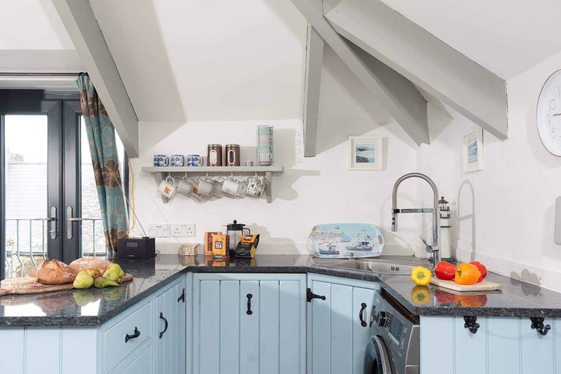 The kitchen area has all you need to cook up a feast.