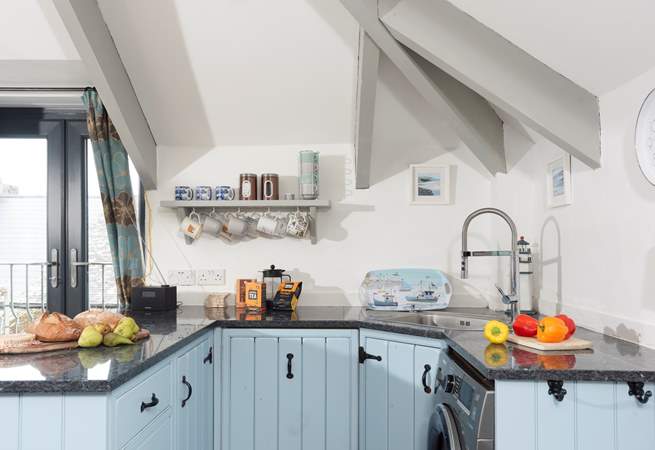 The kitchen area has all you need to cook up a feast.