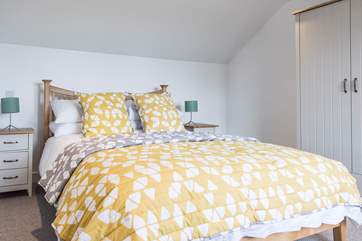 The second double bedroom on the first floor has an adjacent shower-room.