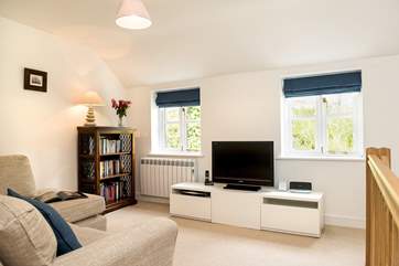The snug-area sits at the top of the stairs.
