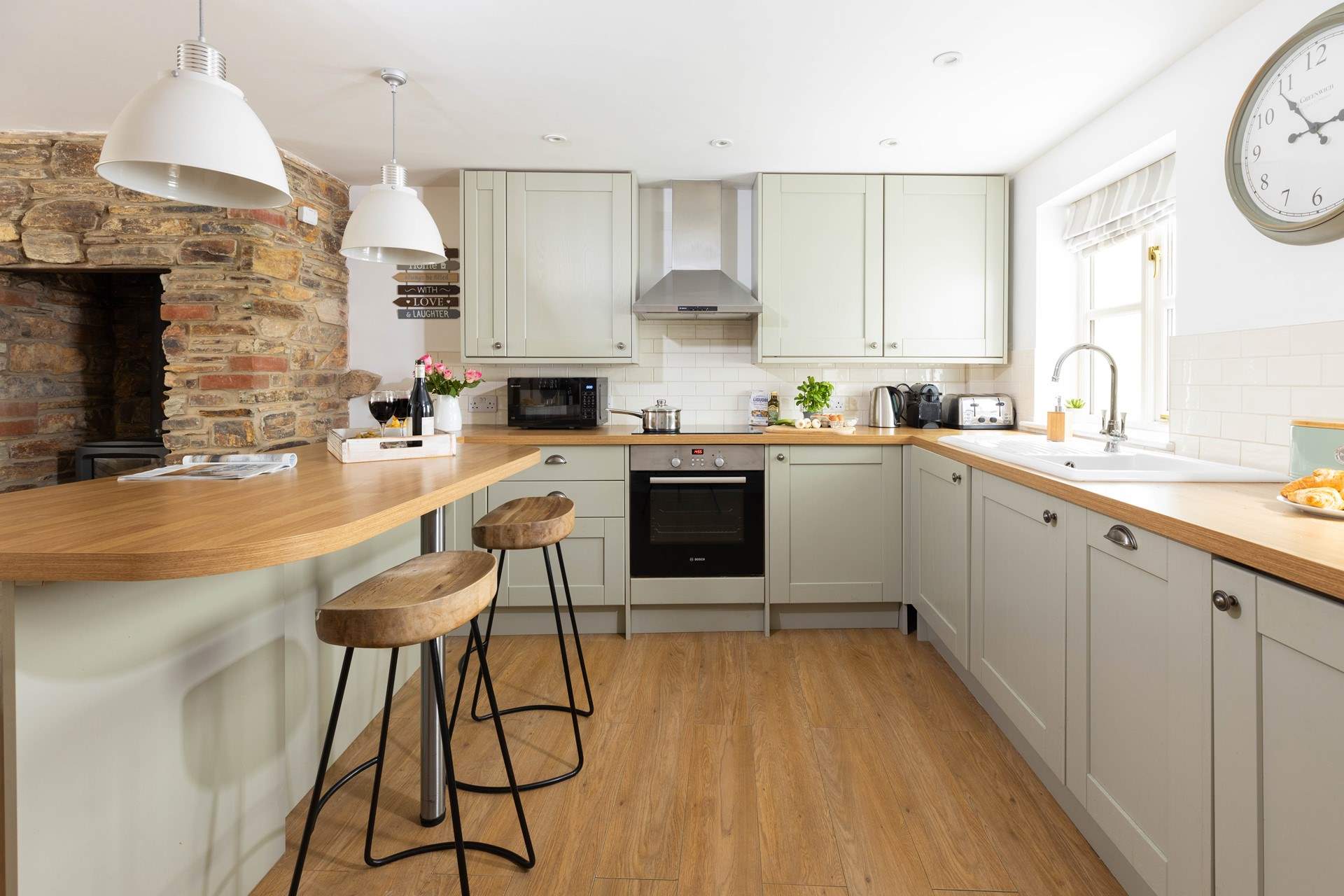 The well equipped  cottage kitchen has everything you might need. 