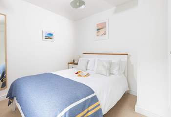 Bedroom 2 has a comfortable double bed and crisp white linens to ensure a good nights slumber. 