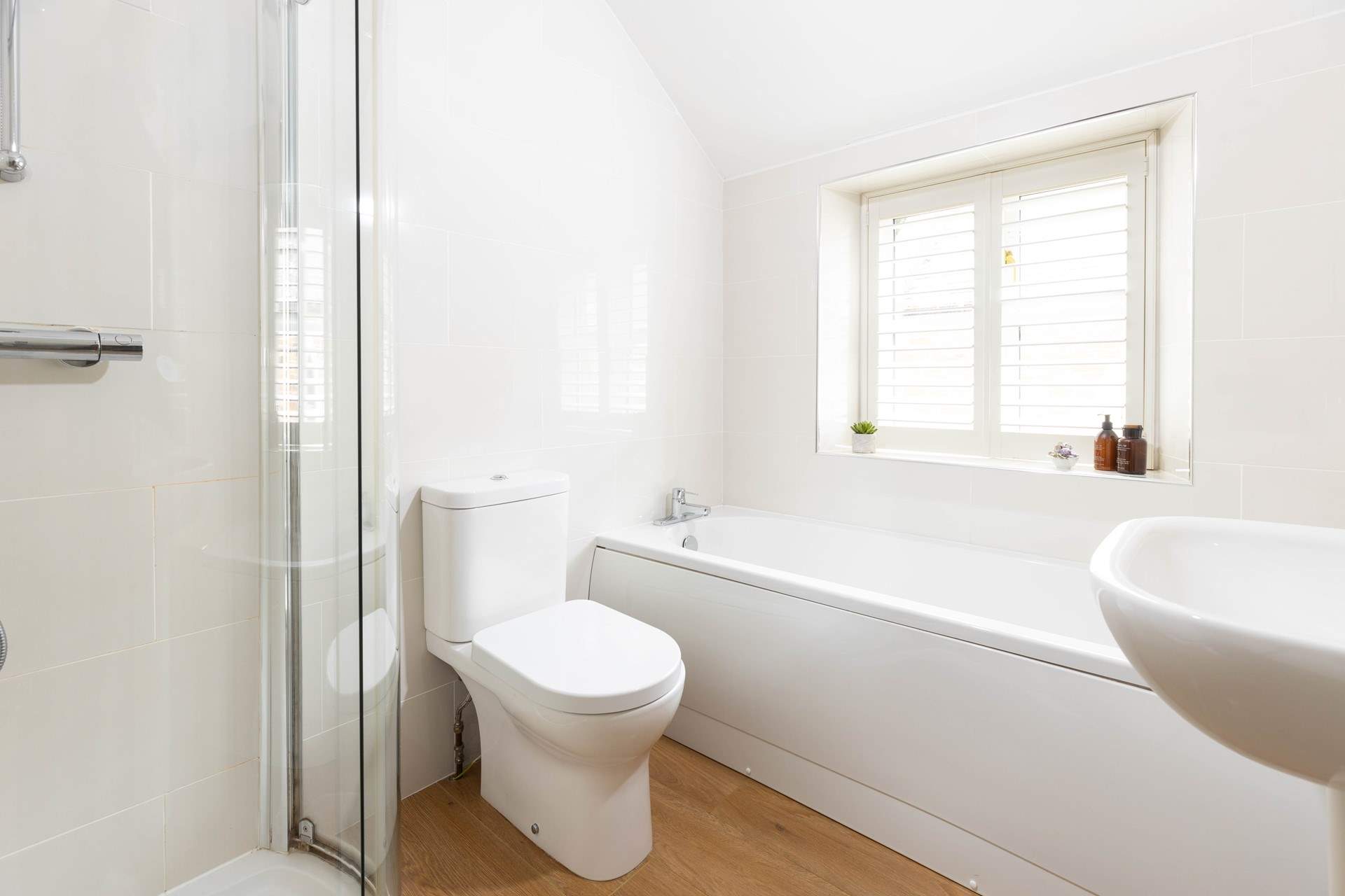 The family bathroom on the first floor has a bath and a separate shower for a good soak. 
