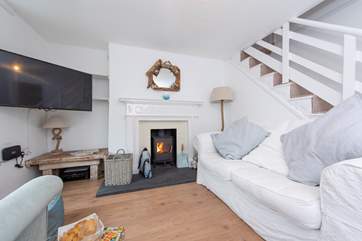 Cosy up in front of the fire.