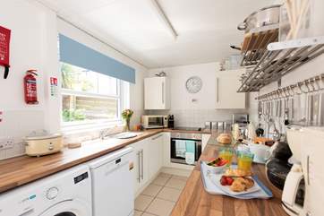 The kitchen looks onto the enclosed courtyard.