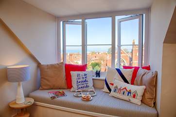 This cosy window seat is the perfect spot to watch the passing ships, whatever the weather!