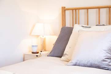 Comfortable soft furnishings, carefully chosen by the owner.