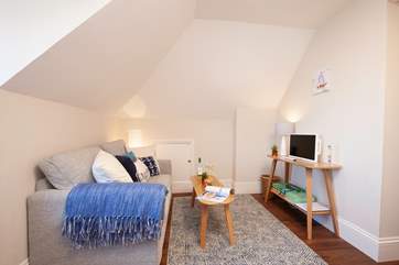 Newly refurbished throughout, the modern sitting/dining-room is a great place to relax.