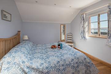 The large double bedroom also boasts amazing water views.