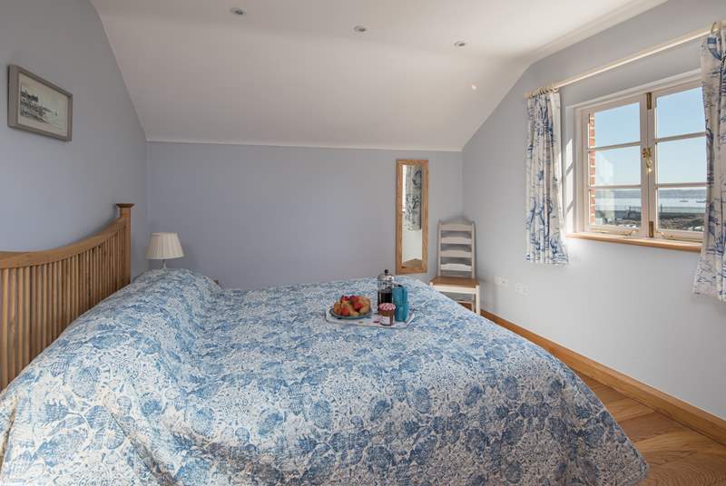 The large double bedroom also boasts amazing water views.