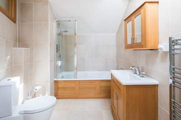 Large bathroom which is situated right next to the bedroom.