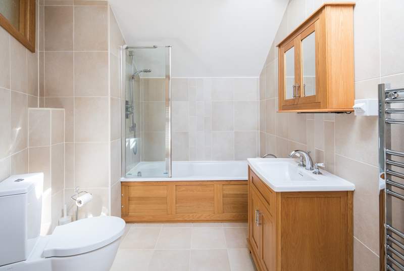 Large bathroom which is situated right next to the bedroom.