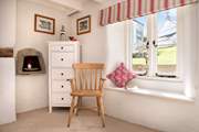 The cottage retains some original features adding to the overall charm.