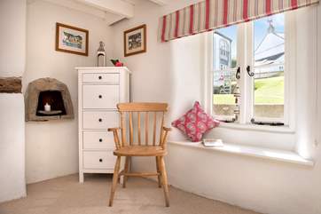 The cottage retains some original features adding to the overall charm.