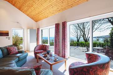 The open plan kitchen and living area has beautiful views towards Portscatho.