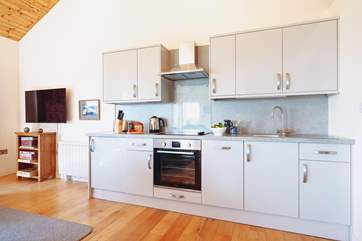 The kitchen area, supplied with all the necessities for your Cornish getaway.