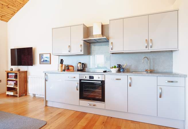 The kitchen area, supplied with all the necessities for your Cornish getaway.