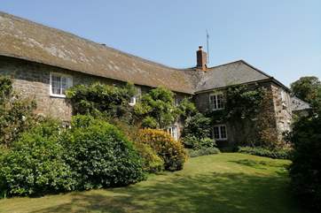 Affeton Barton is the greater part of this historic Devon longhouse. It is filled with character, has a huge private garden, tennis court and seasonal open air swimming pool.