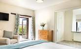 Bedroom 1 is a lovely room - light and airy with lots of space and your own TV! - Thumbnail Image