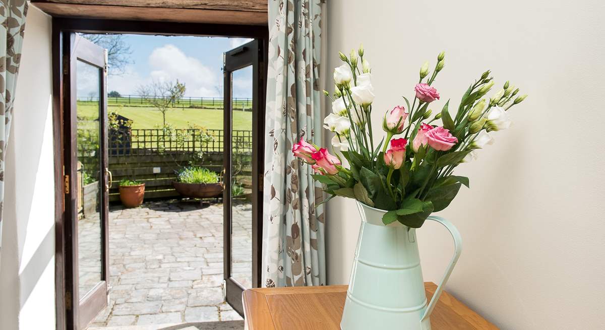 The French windows lead out onto the terrace...