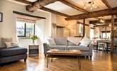 The open beams and wooden floors add to the overall character and charm. - Thumbnail Image