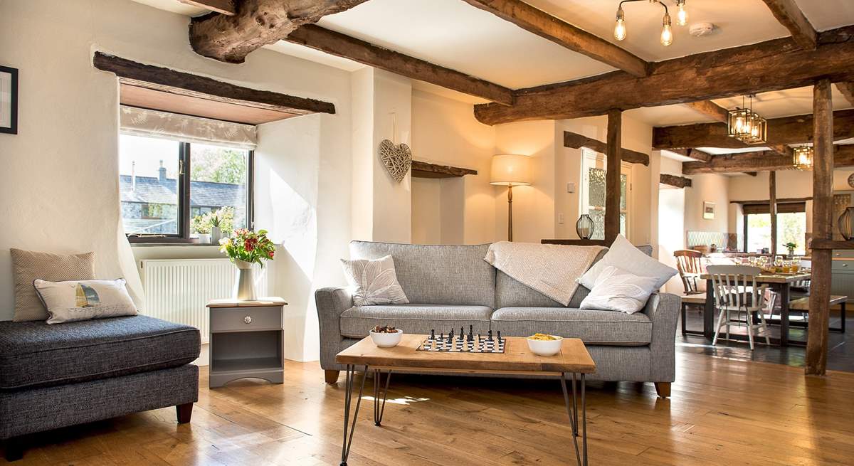 The open beams and wooden floors add to the overall character and charm.