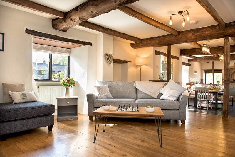 The open beams and wooden floors add to the overall character and charm.
