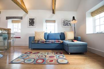 Relax in comfort on the corner sofa.
