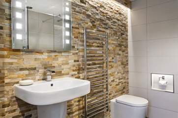 There is cosy under-floor heating and a heated towel rail.