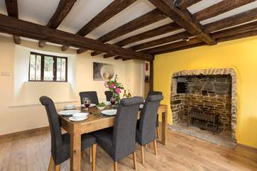 The dining-room has the feature of this ornamental fireplace.