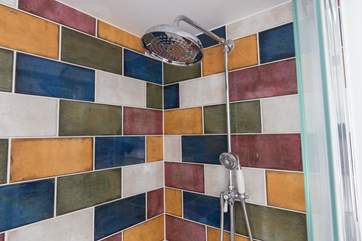 There are two shower heads so that you can have a rainfull drenching or use the lower shower head for children.