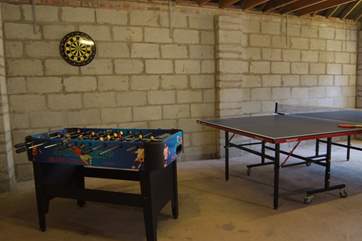 There is a games room in the garage. Access is through the garden. This is separate to the outbuilding which offers safe bike storage.