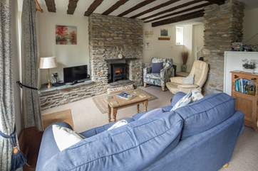 Cosy living-room, with electric wood-burner effect stove at your disposal at a flick of a switch.