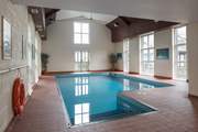 If the outdoor pool doesn't tickle your fancy, this large indoor heated pool is also available.