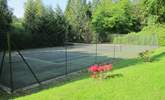 Another view of the well-maintained tennis court. - Thumbnail Image