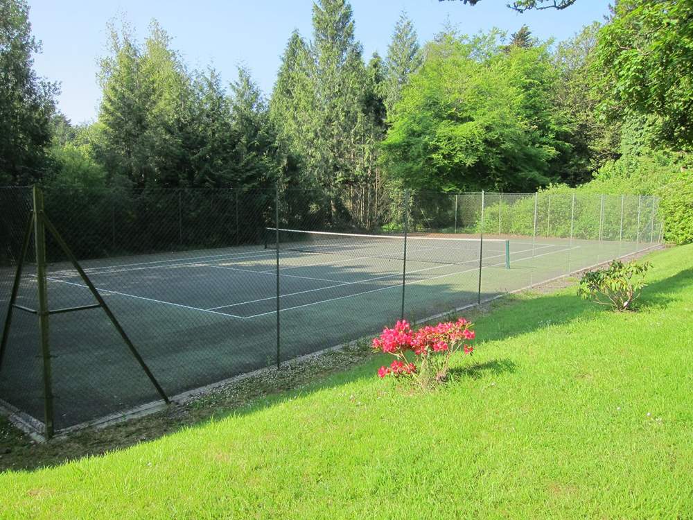 Another view of the well-maintained tennis court.