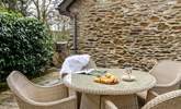 The patio is a lovely space to soak up the sunshine. - Thumbnail Image