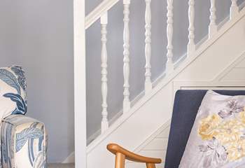 Head upstairs to both bedrooms. 