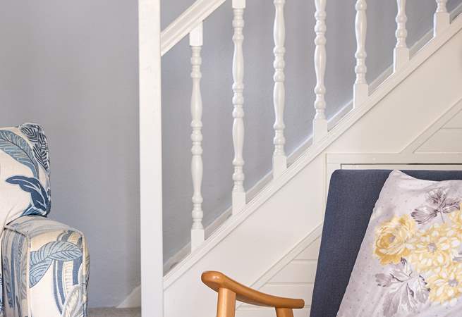 Head upstairs to both bedrooms. 