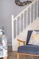 Head upstairs to both bedrooms.
