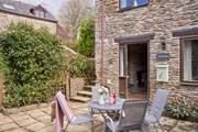 The gorgeous courtyard garden also has a raised courtyard area.