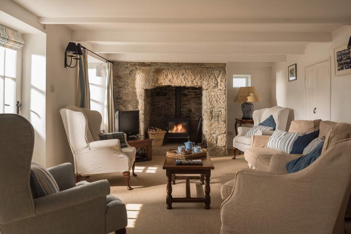 Warm your toes in front of the wood-burner.