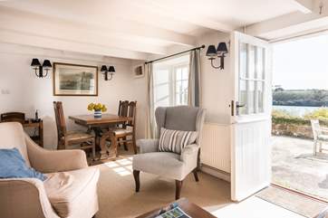 There is space for everyone to relax in the sitting-room.